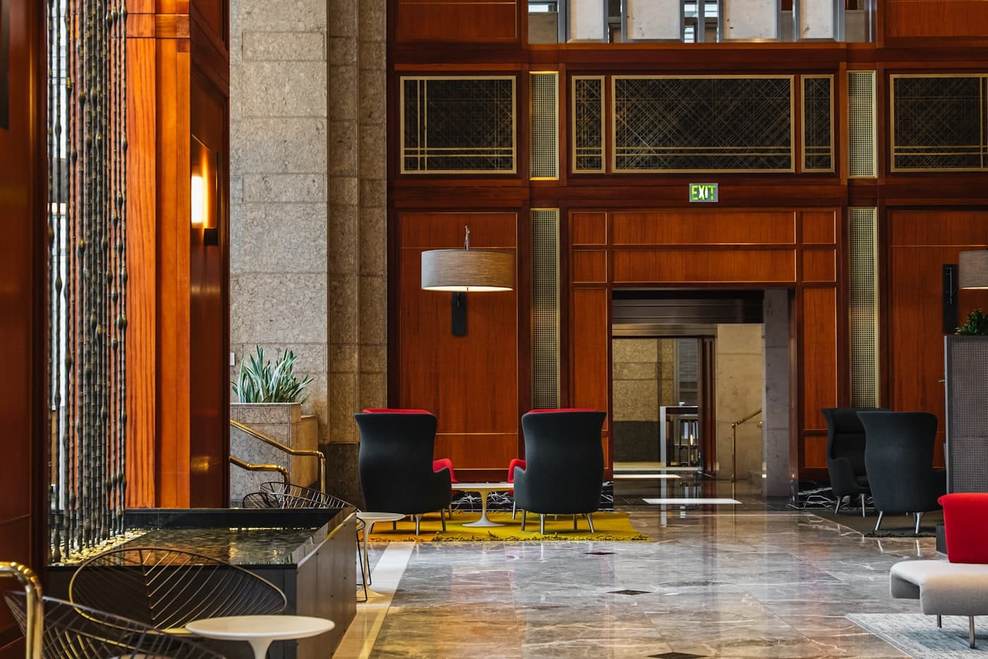 The wood-panelled reception lobby of a private members' club, reserved for members and their guests