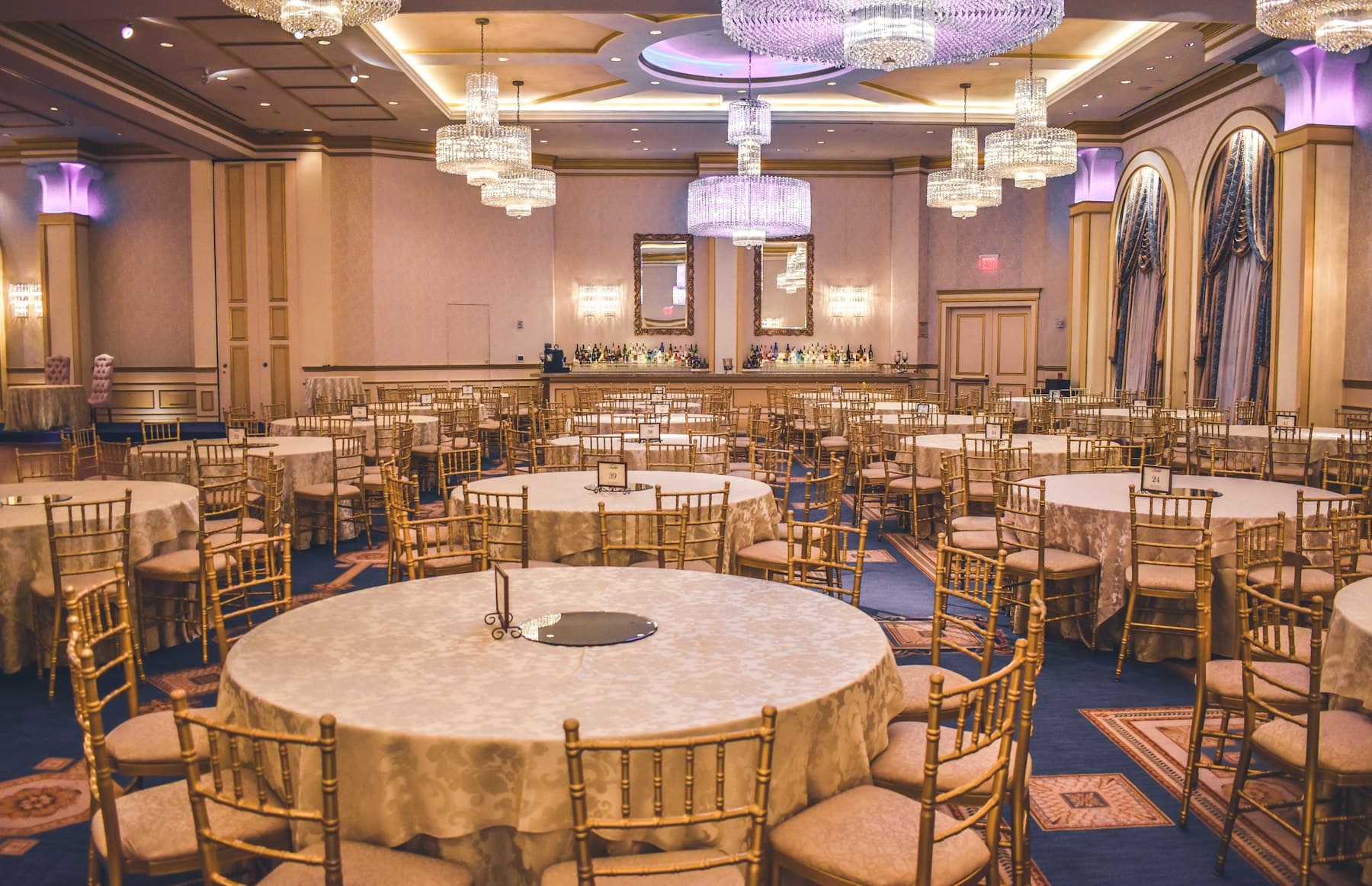 A club ballroom set for an evening event